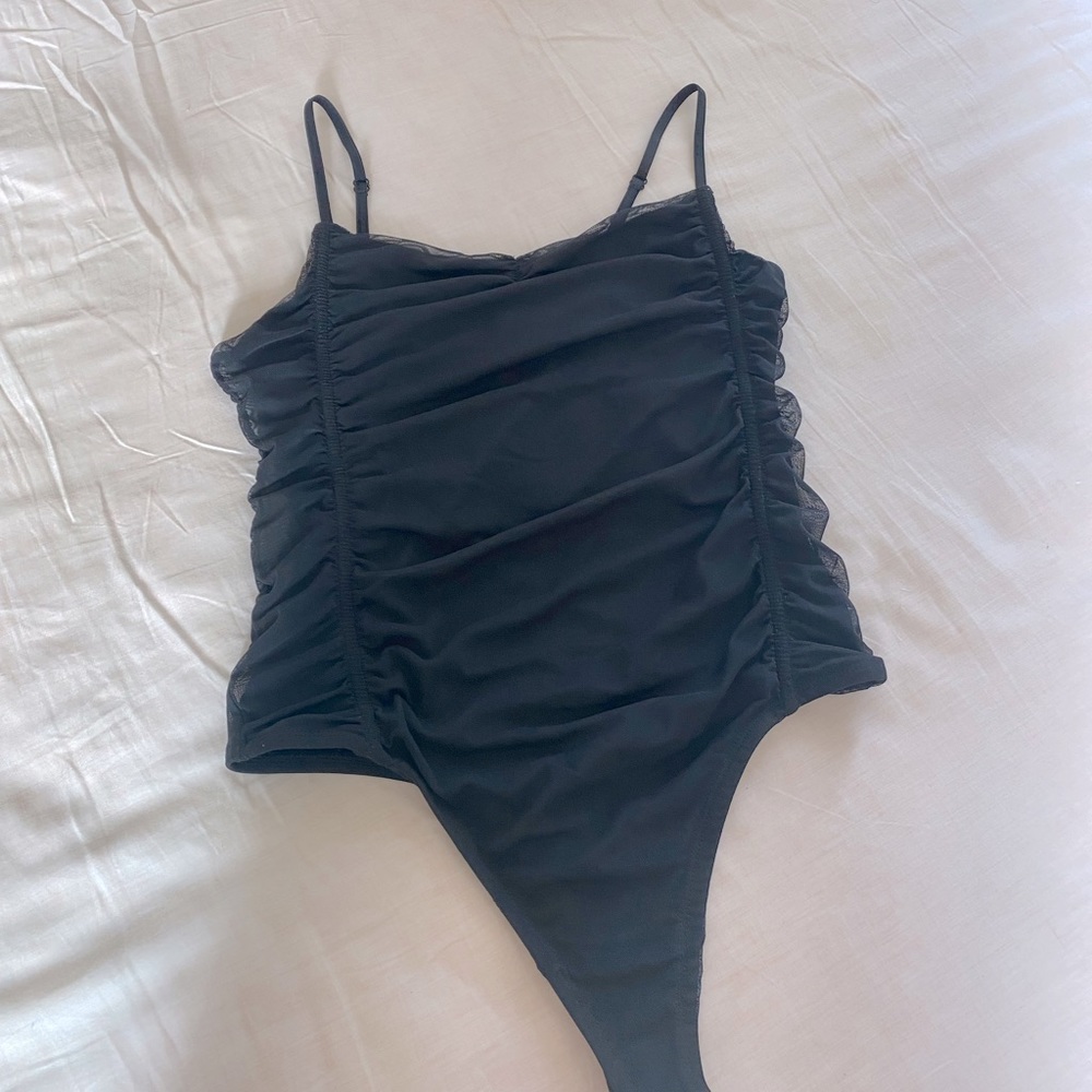 Like new Anthropologie black bodysuit